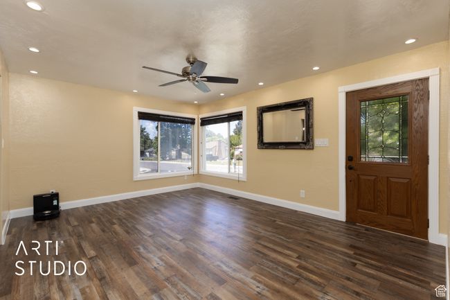 Foyer with dark wood-style floors, ceiling fan, baseboards, and recessed lighting | Image 38