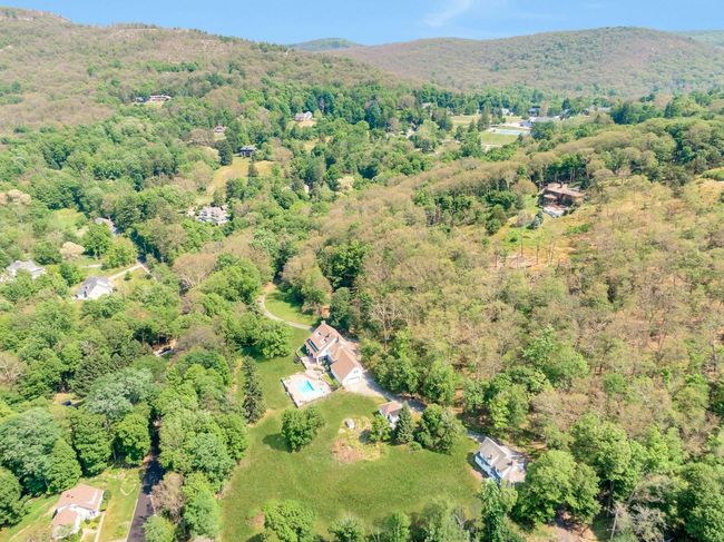Drone / aerial view featuring a mountain view and a forest view | Image 49