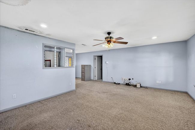 Spare room with carpet, ceiling fan, and recessed lighting | Image 27