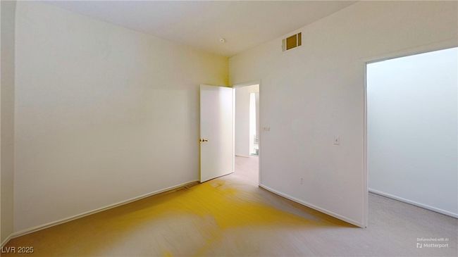 Bedroom 2 with baseboards, visible vents, and light colored carpet | Image 11