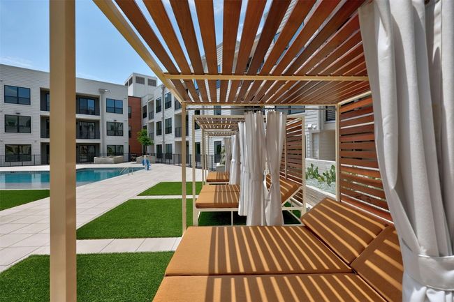 View of patio featuring a community pool | Image 26