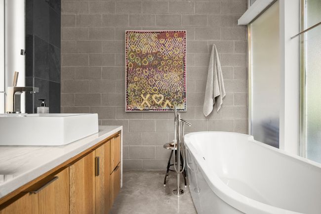 Secondary bathroom on the main level- filtered light, privacy glass, Duravit Soaking tub, HansGrohe Axor plumbing fixtures, Toto toilets | Image 7