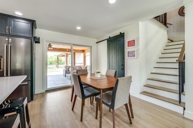 Dining area opens to kitchen and living! | Image 4