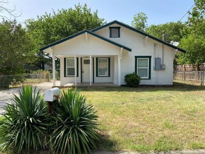 Bungalow-style house with a front yard | Image 1