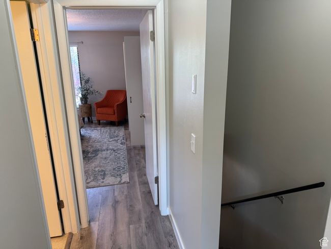 Corridor with wood finished floors and baseboards | Image 22