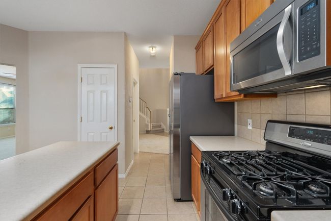 Kitchen featuring stainless steel appliances | Image 13