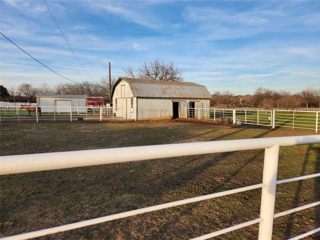 Stable featuring a view of countryside | Image 4