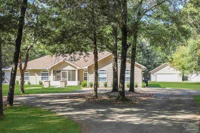 4454 Lyons Pl, House other with 3 bedrooms, 2 bathrooms and 3 parking in Holt FL | Image 1