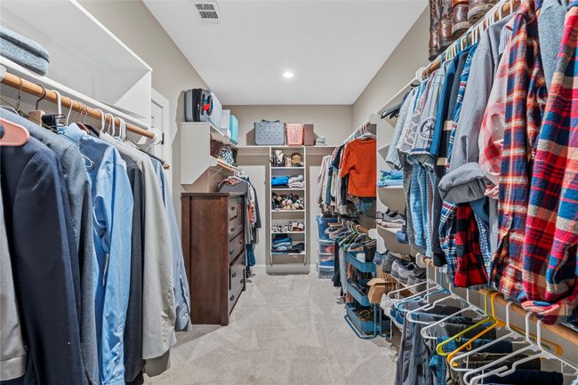 Spacious closet with visible vents and carpet | Image 26