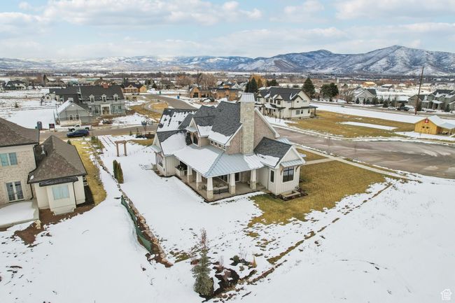 Snowy aerial view with a residential view and a mountain view | Image 68