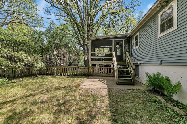 Enjoy backyard festivities with a partially fenced in backyard and screened in porch! | Image 26