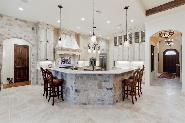 Beautiful natural stone kitchen bar sets this kitchen to the next level! | Image 12