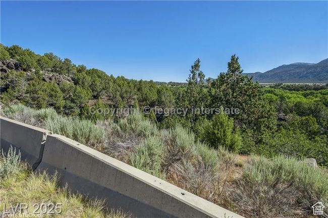View of mountain background with a forest | Image 6
