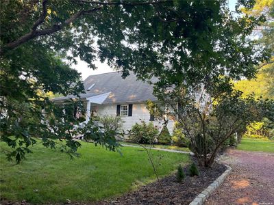 211 Halsey Manor Road, House other with 5 bedrooms, 3 bathrooms and null parking in Manorville NY | Image 1