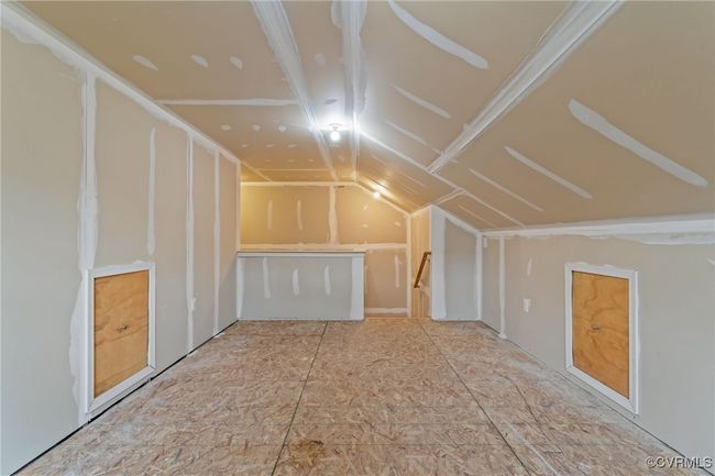 Additional living space featuring lofted ceiling | Image 33