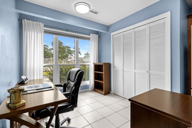 Home office with light tile patterned flooring | Image 6