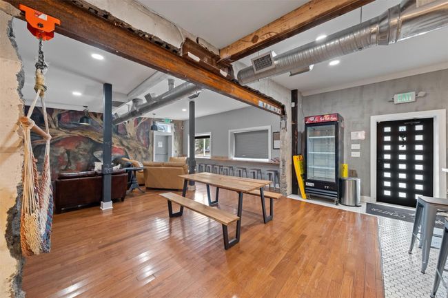 Rec room featuring beam ceiling, hardwood / wood-style floors, visible vents, and recessed lighting | Image 8