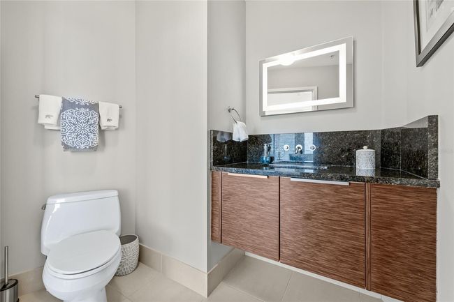 Powder centrally located off living room | Image 36