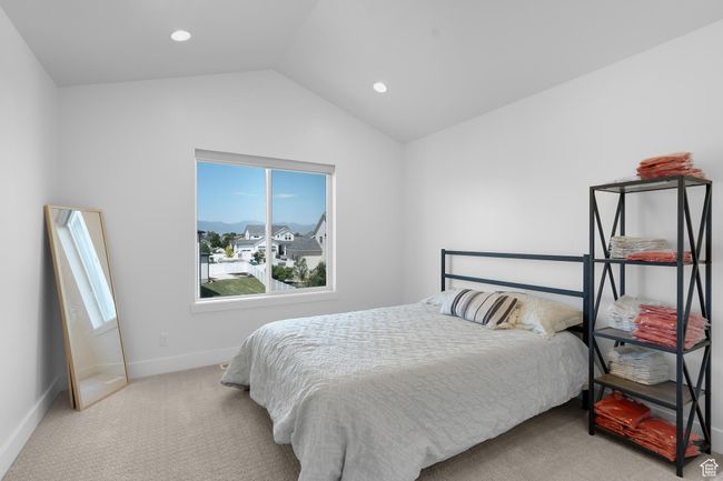 Bedroom 5 featuring vaulted ceiling and recessed lighting | Image 28