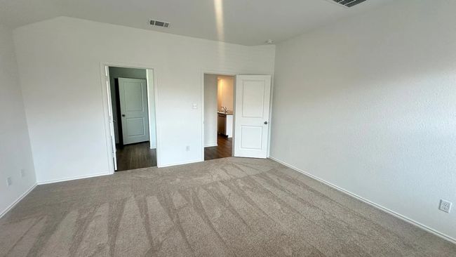 Unfurnished bedroom featuring baseboards and carpet | Image 22
