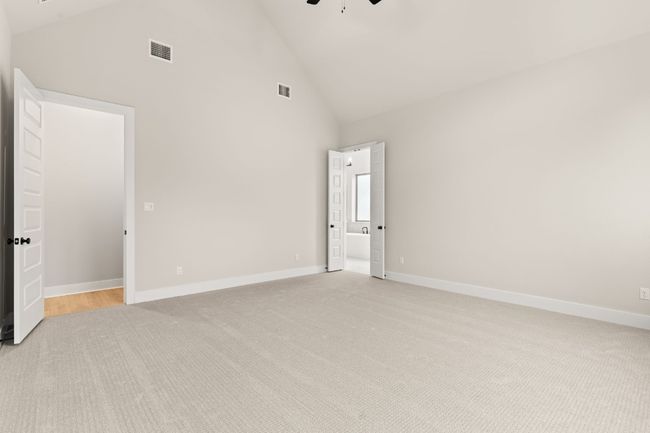 Primary Bedroom with elevated ceiling | Image 20
