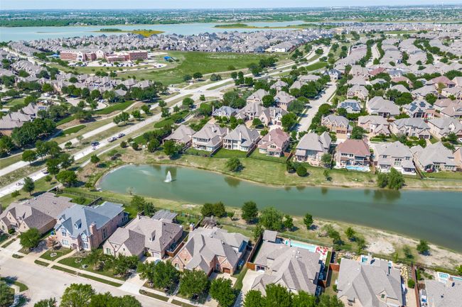 The Tribute is nestled on a picturesque 3-mile peninsula extending into Lake Lewisville, offering a resort-style lifestyle with unmatched water views. Miles of scenic hiking and biking trails wind through the community, along with a variety of outdoor amenities designed to inspire family adventures and time spent in nature. | Image 37