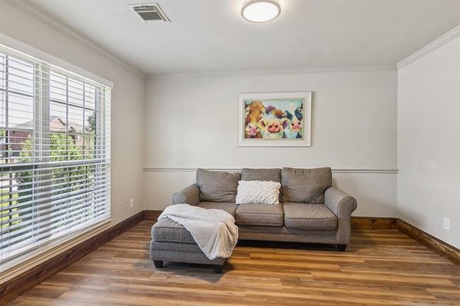 Crown molding and double windows. | Image 7