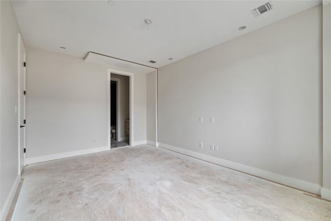 Spare room with baseboards and visible vents | Image 32