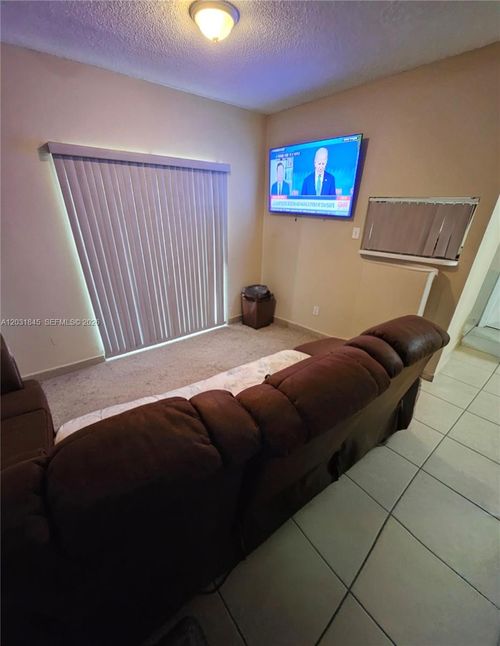 e17-631 Cypress Lake Blvd, Deerfield Beach, FL, 33064-5087 | Card Image