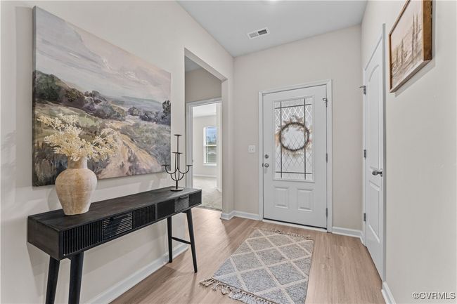 Entryway with light wood-type flooring and baseboards | Image 8