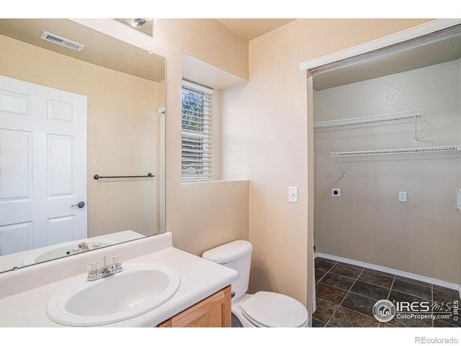 Main Floor Powder Bath and Laundry Area | Image 9