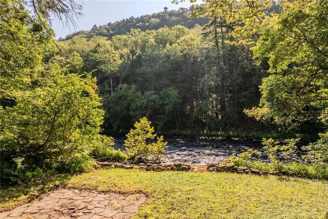 View of yard overlooking Neversink River | Image 21
