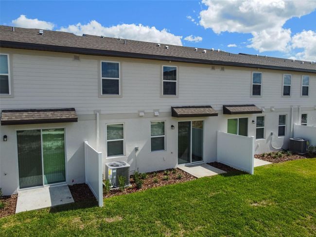 7705 Momentum Parkway Parkway, Townhouse with 3 bedrooms, 2 bathrooms and null parking in Wesley Chapel FL | Image 26