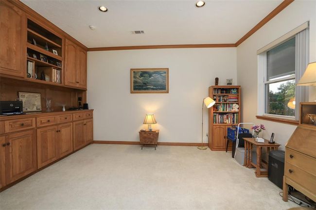 This is a very versatile room. It could be another bedroom, or could be used as a study. | Image 15