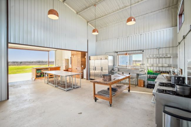 Cool copper lighting brighten your kitchen/workshop space. Endless possibilities here for creative spirits - chefs, artists, creators, fabricators, welders, woodworkers, teachers - there's room for you and ALL your tools of your trade. | Image 17