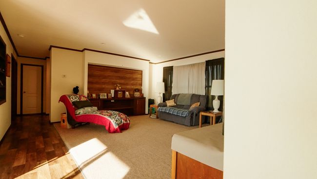 Living area featuring crown molding | Image 23