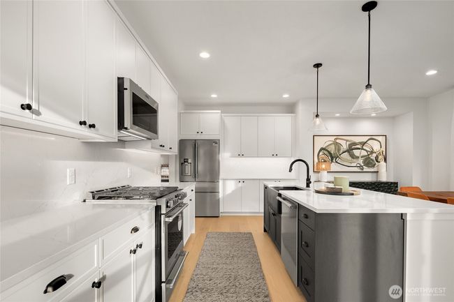 As the newest PNW master-planned community, enjoy 200+ acres of open space, trails & the Coal Trax Mt Bike Park. Soaring ceilings in the great roommake each day worthy of celebration & open floorplan appeals to entertaining. Covered deck & patio. Southern-facing homesites range from the mid600s- 900ks. Enjoy a variety of innovative & distinctive new home options with the best all-season recreation just moments away! Built for the future, indulge in a retreat just 90-min to Seattle. Plans and elevations are artist’s renderings only, may not accurately represent the actual condition of a home asconstructed and may also contain options and upgrades which are not included in the sale. Trailside Homes reserves the right to make changes to the floorplan, specifications, dimensions, design and elevations without prior notice. Stated dimensions and square footage are estimated and should not be usedas representations of the home’s actual size. | Image 14