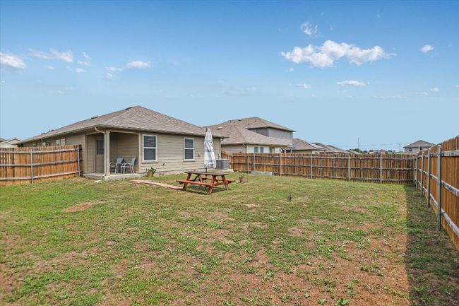 View of yard with a fenced backyard and central AC | Image 18