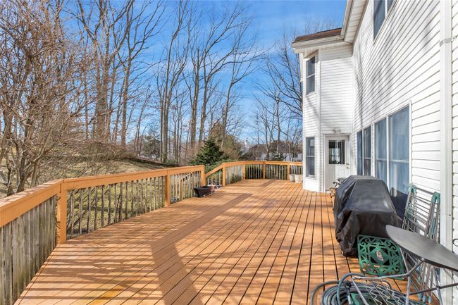 Wooden deck featuring grilling area | Image 23