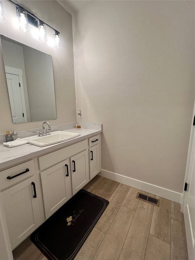 Bathroom with lvp floors and double sink vanity | Image 16