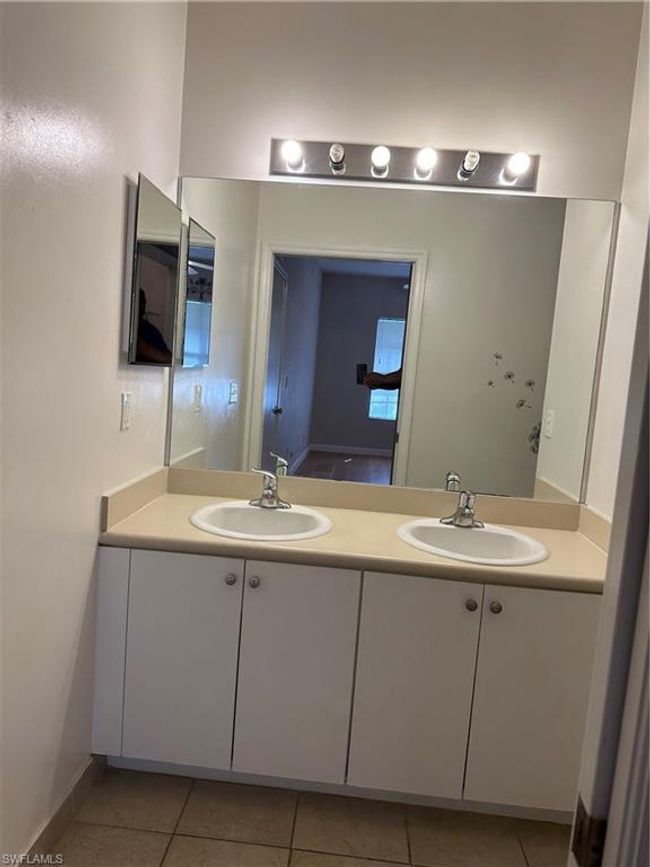 Bathroom featuring vanity and tile patterned flooring | Image 13