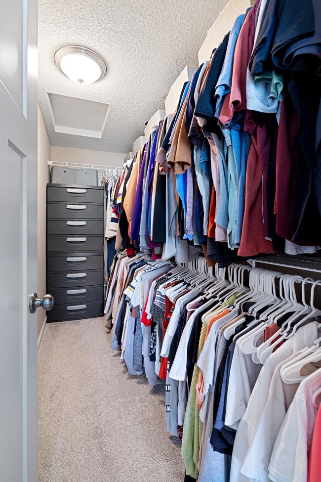 Primary bedroom walk-in closet. | Image 19