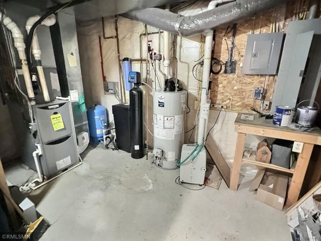 View of the lower level utility room. The lower level also has a recently finished three-quarter bathroom. | Image 28