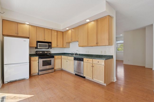 Great space in the kitchen to add an island. Open up to living and dining room. | Image 15