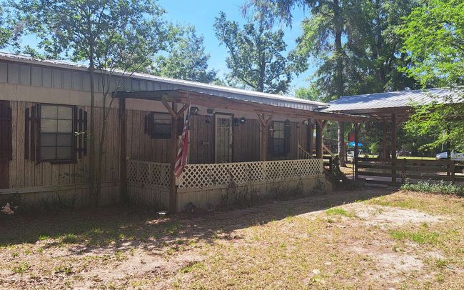 151 Sw Shellcracker Dr, House other with 2 bedrooms, 1 bathrooms and 2 parking in Fort White FL | Image 4