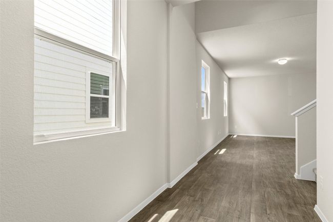 Hall with wood finished floors and stairs | Image 7