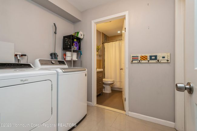 Laundry Room is conveniently located close to bedroom and bath | Image 21