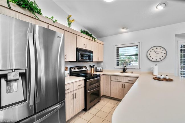 12321 Moon Shell Dr, House other with 3 bedrooms, 3 bathrooms and 2 parking in MATLACHA ISLES FL | Image 9