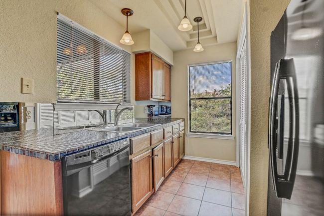 Kitchen with Real wood cabinetry | Image 12