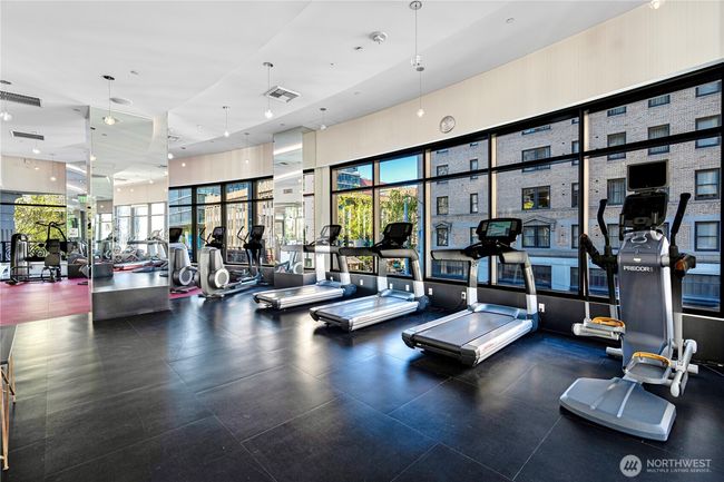 Expansive fitness center with state-of-the-art equipment and views of lively Virginia Avenue | Image 20